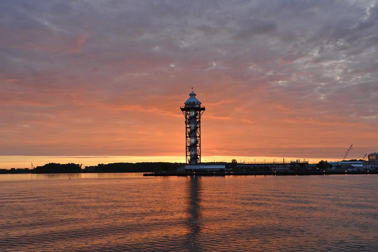 Shown here June 15 is a sunrise over the Bicentennial tower at Dobbins Landing on Presque Isle Bay in Erie.