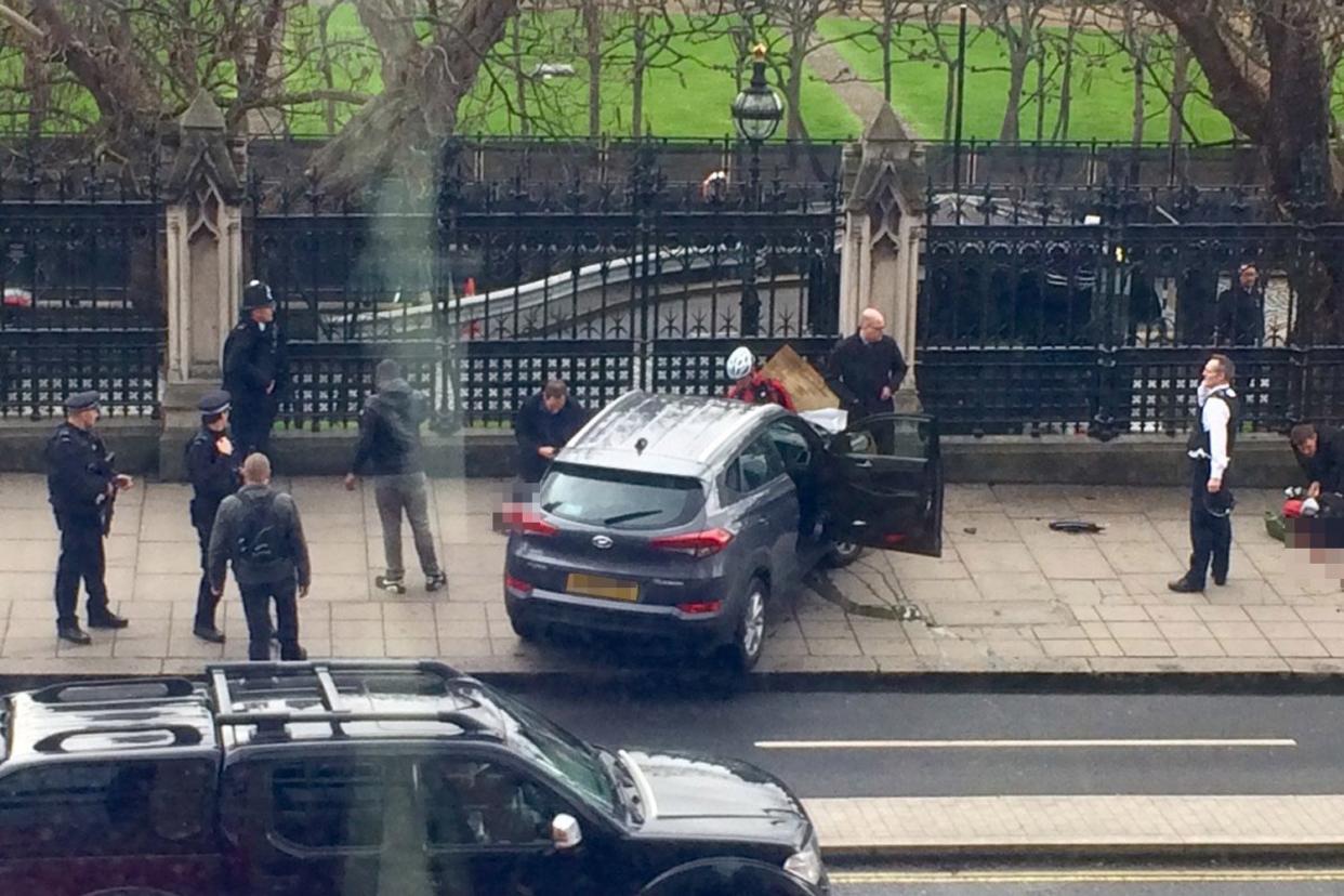 Atrocity: the scene outside Parliament after the killer, Khalid Masood, hit pedestrians with a 4x4: @Lukesteele4