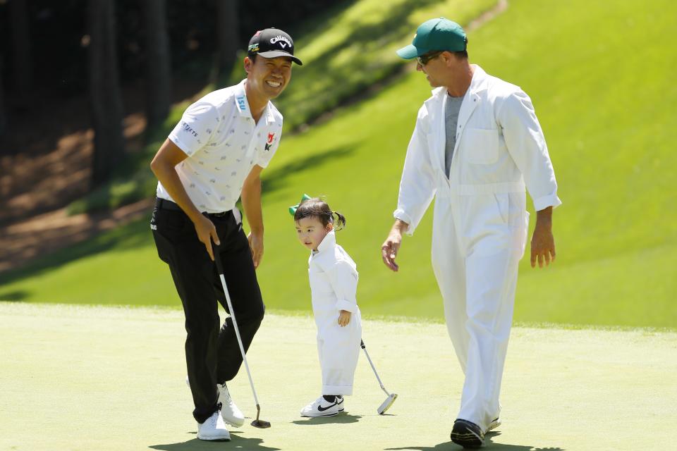 AUGUSTA, GEORGIA - APRIL 10: Kevin Na of the United States stands with daughter Sophia during the Par 3 Contest prior to the Masters at Augusta National Golf Club on April 10, 2019 in Augusta, Georgia. (Photo by Kevin C. Cox/Getty Images)