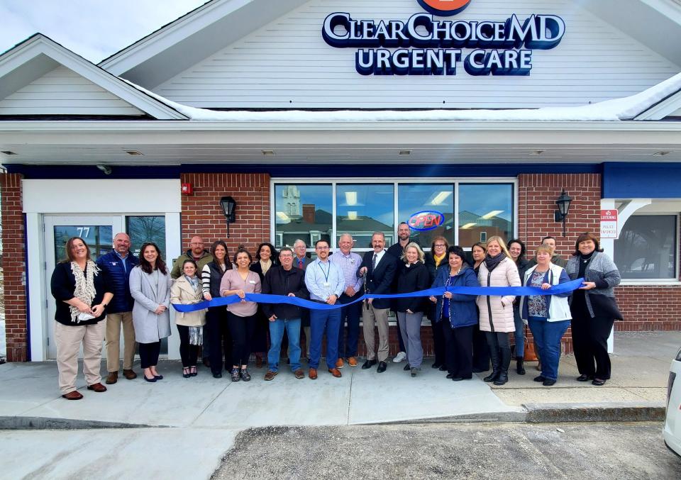 Dr. Marcus Hampers, ClearChoiceMD CEO doing the ribbon cutting honors along with Adam Mason, Director of Facilities; Rachel Tremblay, Regional Practice Manager; Frances Goodwin, Practice Manager; Gray Harrington, Business Manager and Lynne Turmel, Director of Marketing. Also, Amy Brown, Yankee Electric & Co., LLC; David Richard, D.F. Richard Energy; Brylye Collins, Rose Talent Consulting, LLC; David Stevens, Century 21 Northeast; Harrison Thorp, The Rochester Voice; Tim Jones, Frisbie Memorial Hospital CEO along with others from Frisbie; Matt Wyatt, City of Rochester; Sharla Rollins, First Seacoast Bank; Greater Rochester Chamber of Commerce President/CEO Laura Ring; Jenn Marsh, Rochester Economic Development; Tatjana Simon, Northeast Credit Union; Kendall Spewock, Admiral Property Co., LLC; Kristen White, Northeast Credit Union; Carole Glenn, Rochester Economic Development, and Mary Henderson, Bank of New Hampshire