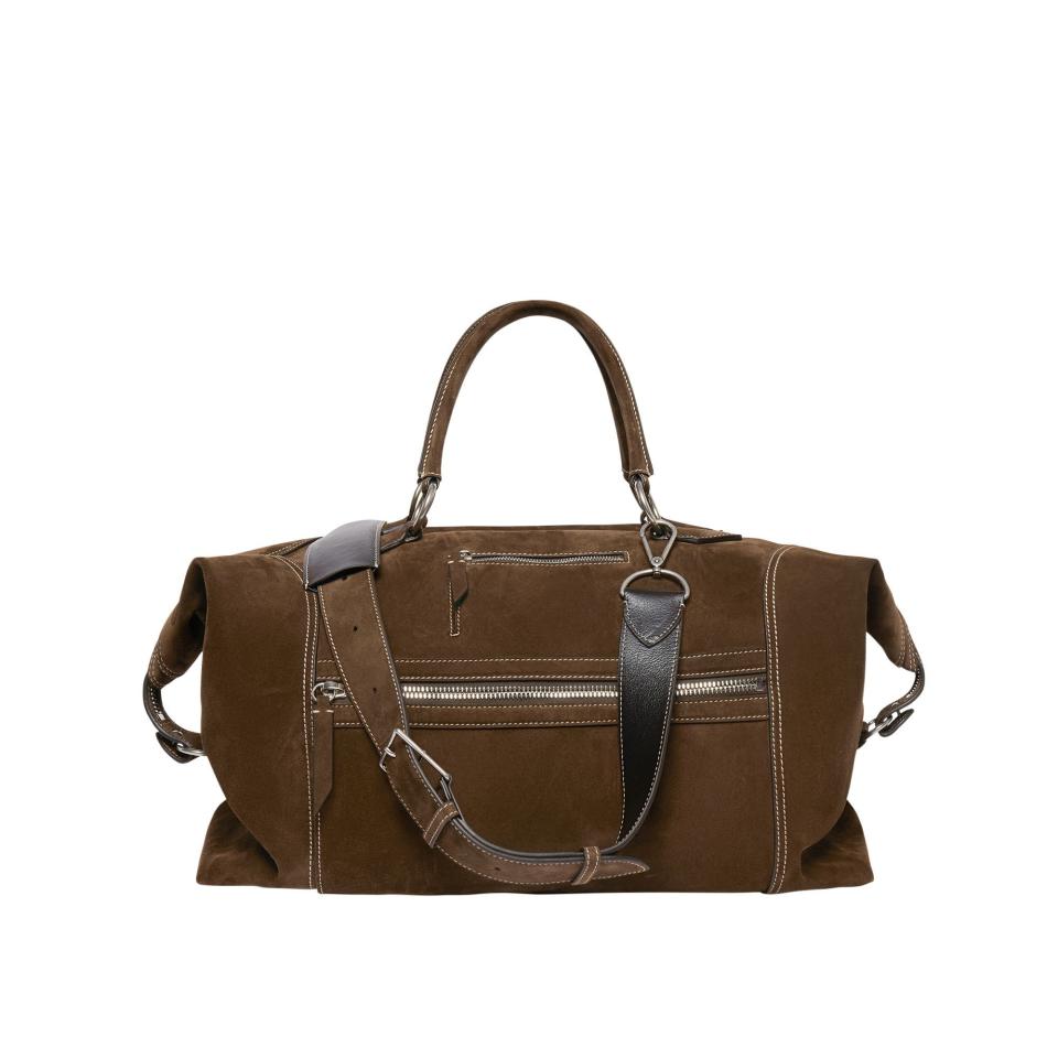 <p><a href="https://us.metier.com/products/indiana-jones-vagabond-duffle-chocolate-suede-womens-1" rel="nofollow noopener" target="_blank" data-ylk="slk:Shop Now;elm:context_link;itc:0;sec:content-canvas" class="link ">Shop Now</a></p><p>Indiana Jones™ Vagabond Duffel</p><p>$4650.00</p>