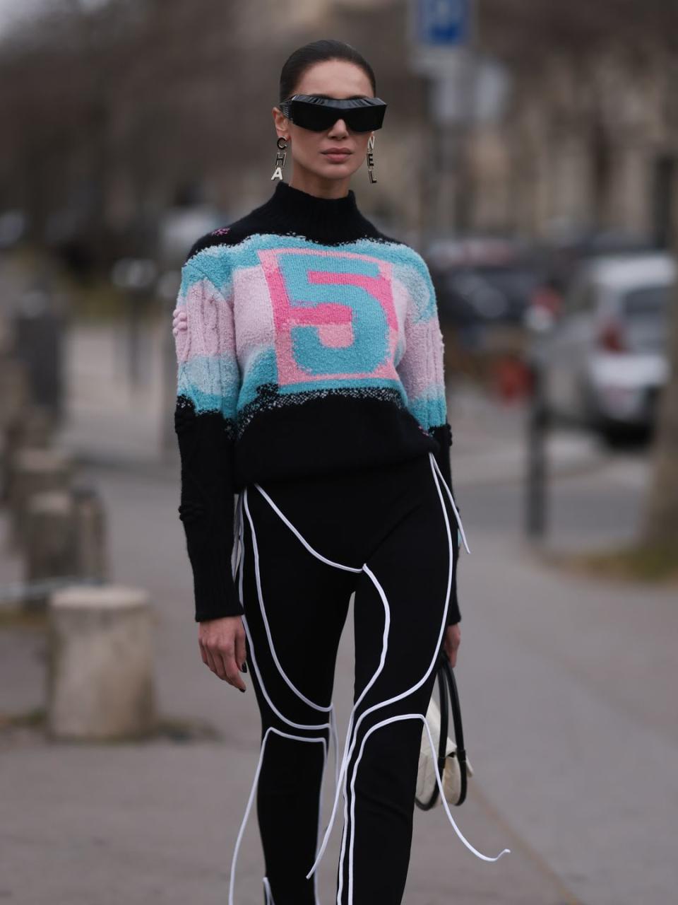 Sabina Jakubowicz sports a graphic knit alongside black leggings with white detailing 