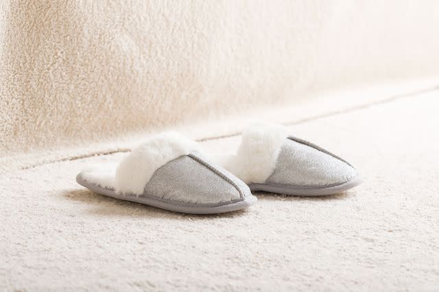 <p>Getty</p> Stock image of bedroom slippers.