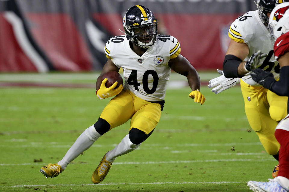 Pittsburgh Steelers running back Kerrith Whyte (40) runs against the Arizona Cardinals during the first half of an NFL football game, Sunday, Dec. 8, 2019, in Glendale, Ariz. (AP Photo/Ross D. Franklin)
