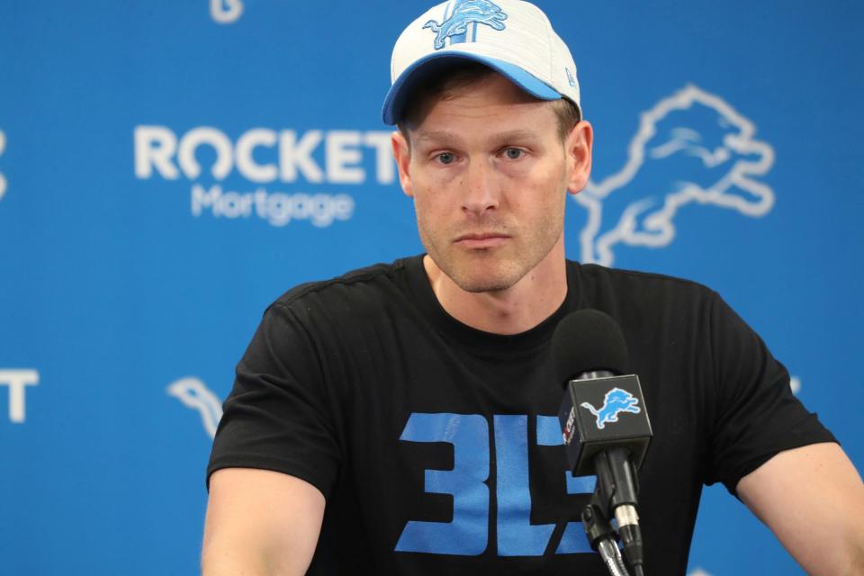 Lions offensive coordinator Ben Johnson talks with reporters before OTAs on Thursday, June 2, 2022, in Allen Park.