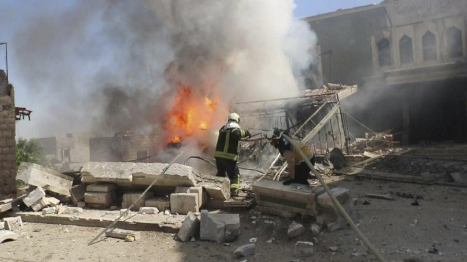 This photo posted May 28, 2019 and provided by the Syrian Civil Defense White Helmets, which has been authenticated based on its contents and other AP reporting, shows Syrian White Helmet civil defense workers trying to extinguish fire following an airstrike by Syrian government forces that targeted a health facility in the town of Kfar Nubul, southern Idlib, Syria. In their latest assault on the last rebel-stronghold of Idlib, the Syrian government and its Russian backer have resorted to familiar tactics to break the will of people and pressure civilians to flee: Target residential areas, bomb hospitals and markets, destroy civilian infrastructure. It is a well-established pattern that worked for President Bashar Assad's forces seeking to recapture Aleppo and other strategic rebel territories during the 8-year war. (Syrian Civil Defense White Helmets via AP, File)