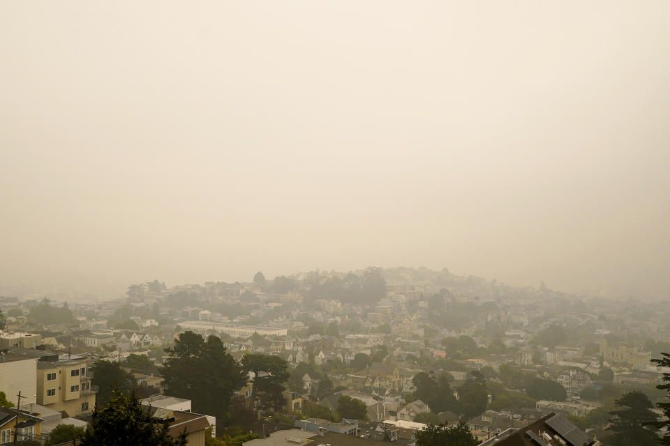 Smoke and haze from wildfires hovers over San Francisco, Thursday morning, Sept. 10, 2020. (AP Photo/Jeff Chiu)