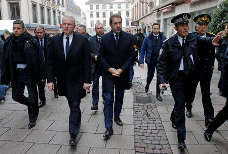 French Interior Minister Christophe Castaner and Paris Prosecutor Remy Heitz walk in a street the day after a shooting in Strasbourg, France, December 12, 2018. REUTERS/Vincent Kessler