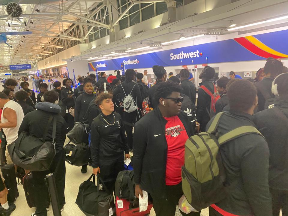 The Santaluces High School football team prepares to fly for a game against John Curtis Christian in Louisiana on Friday, Sept. 16, 2023.