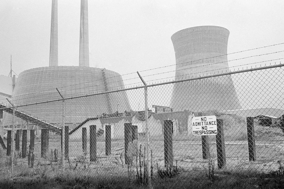 FILE - The Pleasants Power station at Willow Island, West Virginia is shown Aug. 7, 1978. West Virginia regulatory authorities are on a tight timeline to rule on a proposal that would temporarily keep the lights on the coal-fired power plant now slated for June closure. (AP Photo/File)