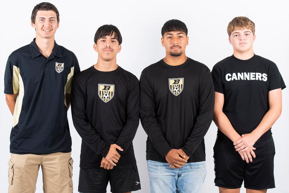 (From right) Biglerville soccer players Sean Sneed, Rodrigo Beltran-Lua, Chuy Salazar-Ruelas and assistant coach Cody Daron pose for a photo during YAIAA fall sports media day on Thursday, August 3, 2023, in York.
