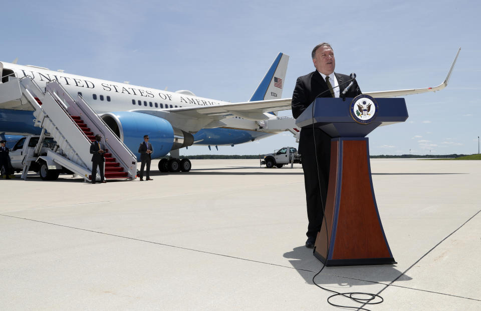Secretary of State Mike Pompeo speaks to the media at Andrews Air Force Base, Md., Sunday, June 23, 2019, before boarding a plane headed to Jeddah, Saudi Arabia. (AP Photo/Jacquelyn Martin, Pool)