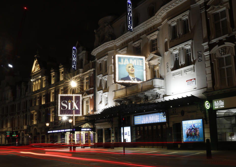 A general view of the exterior of the Apollo Theater in London, Thursday, April 8, 2021, which is preparing to continue its run of the musical "Everybody's Talking About Jamie.' The coronavirus pandemic has devastated British theater, a world-renowned cultural export and major economic force. The theaters in London's West End shut when lockdown began in March 2020, and have remained closed for most of the past 13 months. Now they are preparing, with hope and apprehension, to welcome audiences back. (AP Photo/Alastair Grant)