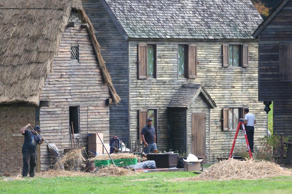 Workers construct the set of Hocus Pocus 2 at Chase Farm in Lincoln