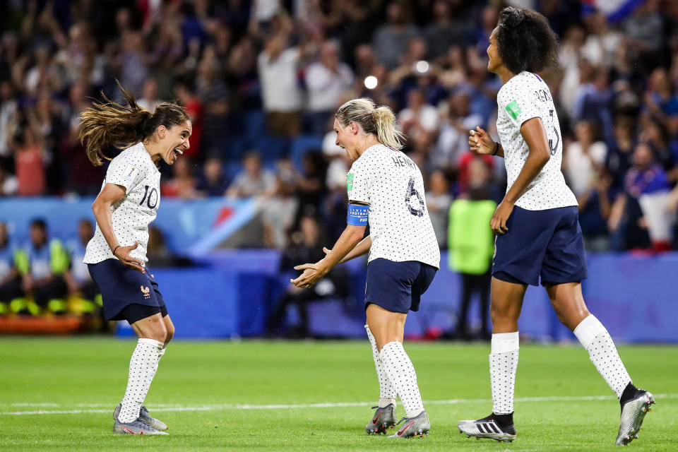 Amandine Henry of France celebrates her goal with teammates the 2019 FIFA Women's World Cup France Round of 16 match between France and Brazil at Stade Oceane on June 23, 2019 in Le Havre, France. (Photo by Zhizhao Wu/Getty Images)