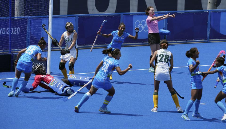 <div class="paragraphs"><p>India's Vandana Katariya celebrates with teammates after scoring a goal against South Africa during a women's hockey match at the Tokyo Olympics.</p></div>