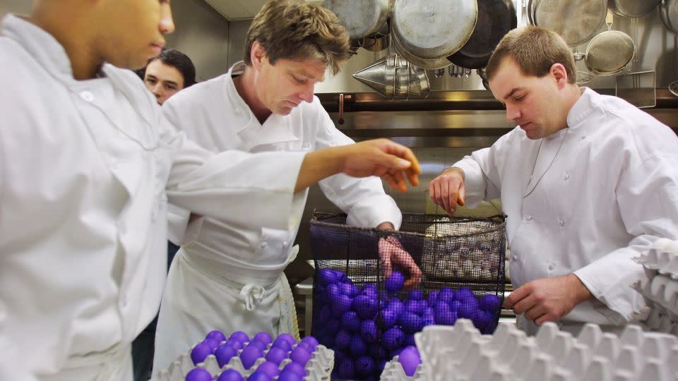 In this 2002 photo, White House kitchen staff transfer boiled, dyed eggs in Washington, DC. - Manny Ceneta/Getty Images/File