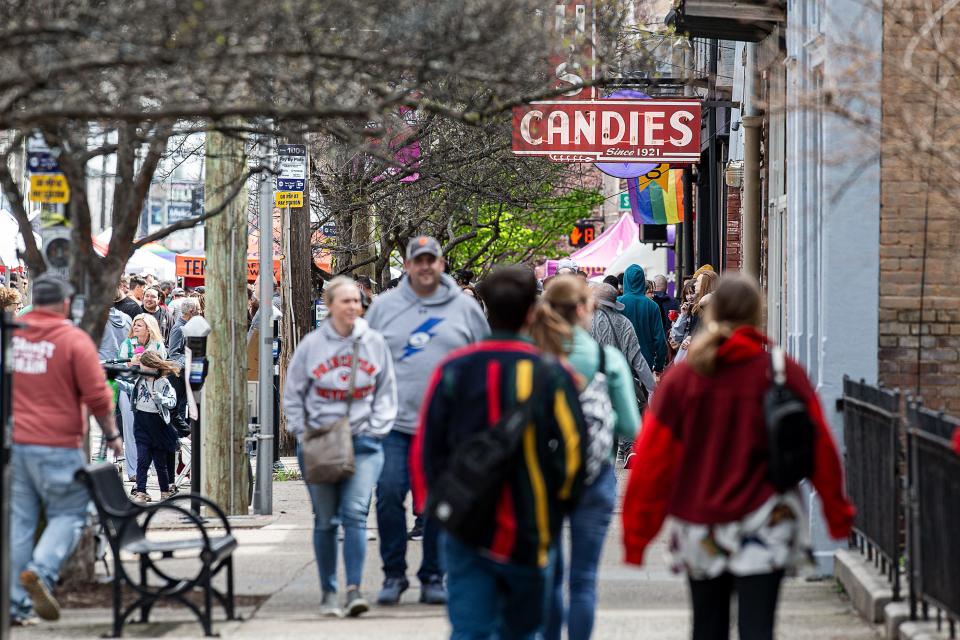 East Market St. was bustling with people at the NuLu Bock Fest on Saturday afternoon in downtown Louisville, Ky. Mar. 25, 2023