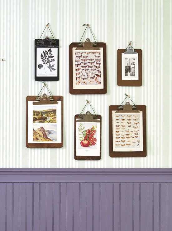 <p>When it comes to gallery walls, frames can get expensive. For this arrangement, simply clip prints to vintage clipboards. Thread a piece of leather jewelry cord under the clip, knot it at the top, and hang with a pushpin.</p><p><a class="link " href="https://www.amazon.com/KONMAY-Yards-Jewelry-Leather-Colors/dp/B07FD54BXB/?tag=syn-yahoo-20&ascsubtag=%5Bartid%7C10050.g.31153820%5Bsrc%7Cyahoo-us" rel="nofollow noopener" target="_blank" data-ylk="slk:SHOP LEATHER JEWELRY CORD;elm:context_link;itc:0;sec:content-canvas">SHOP LEATHER JEWELRY CORD</a></p>