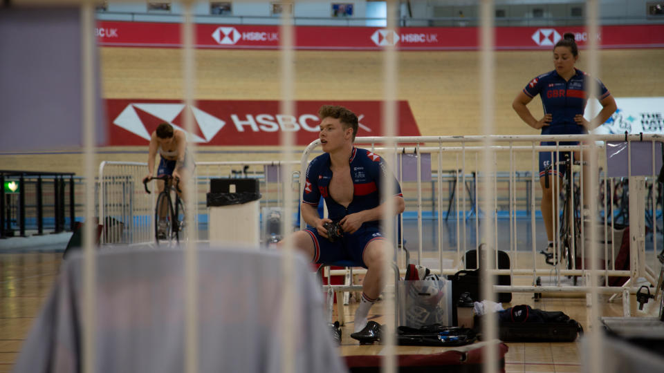 Sprinter Jack Carlin sits in track centre at the velodrome (British Cycling)