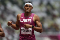 Michael Norman, of United States, competes in a heat in the men's 400-meter run at the 2020 Summer Olympics, Sunday, Aug. 1, 2021, in Tokyo. (AP Photo/Petr David Josek)