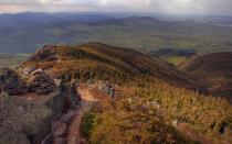 <p>While this National Scenic Trail traverses over 2,180 miles of terrain between Georgia and Maine, some of the most beautiful stretches can be found in New Hampshire’s White Mountains. The 161 miles of trail that pass through here feature more exposed, above tree-line terrain than any other state, affording hikers uninterrupted views of the surrounding mountain ranges. You can’t miss Mt. Washington, the tallest mountain in the northeast. Hikers should be aware that weather changes quickly on the high peaks, and while it can be sunny and 65 degrees in the valleys, it is not uncommon for it to be snowing simultaneously at higher elevations.</p>