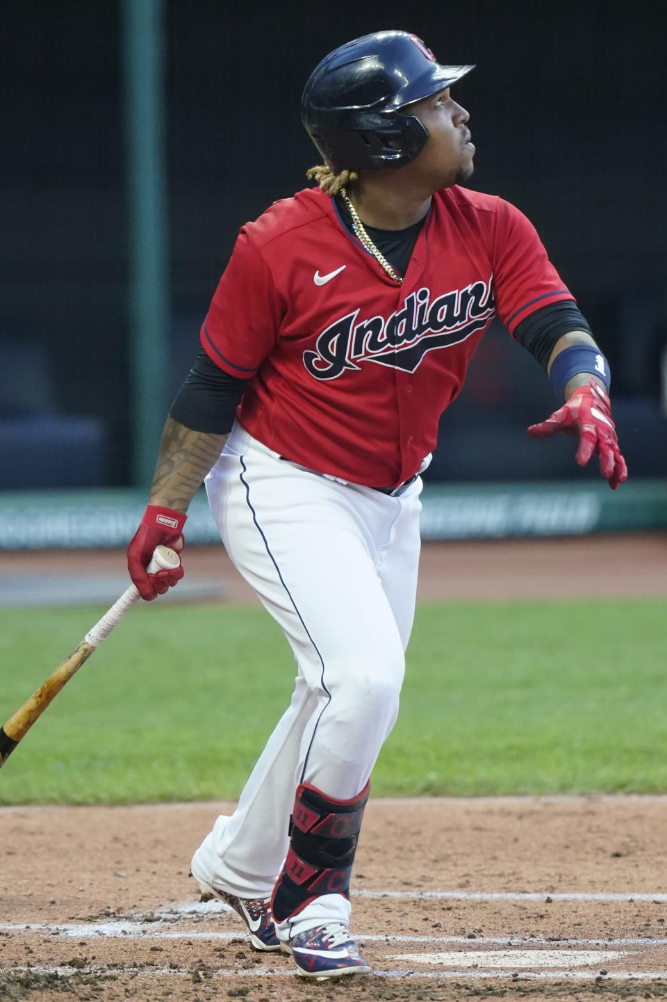 Cleveland Indians' Jose Ramirez watches his RBI-single in the first inning of a baseball game against the Baltimore Orioles, Monday, June 14, 2021, in Cleveland. (AP Photo/Tony Dejak)