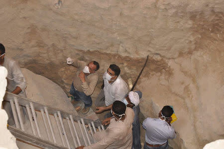 Mostafa Wazir, Secretary General of the Supreme Council of Antiquities, inspects the site of the newly discovered giant black sarcophagus in Sidi Gaber district of Alexandria, Egypt July 19, 2017 in this handout picture courtesy of the Ministry of Antiquities. The Ministry of Antiquities/Handout via Reuters