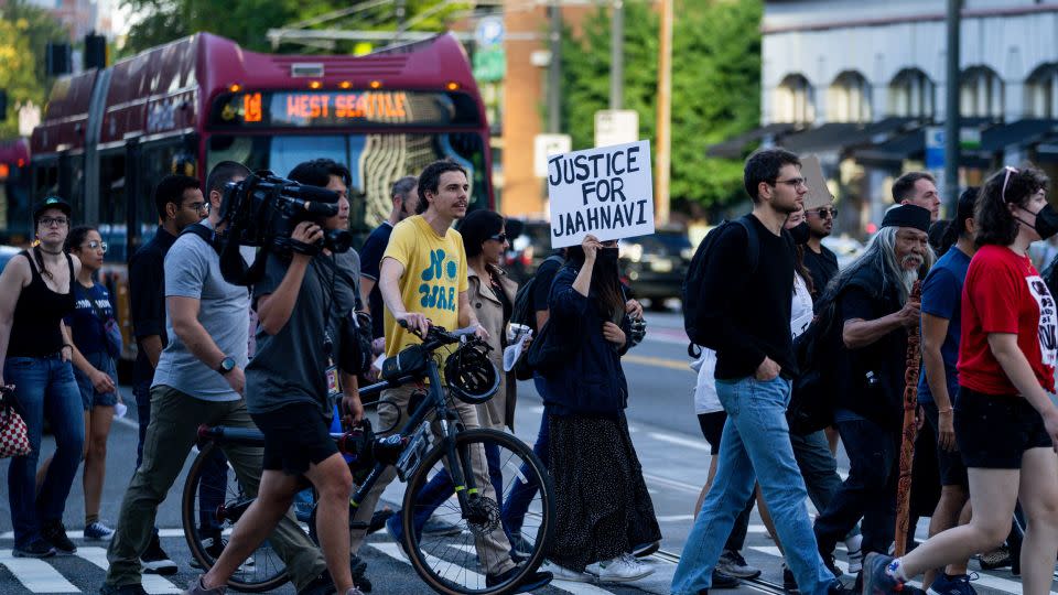 Protesters march late last week through downtown Seattle after the release of body camera footage of a city officer apparently joking about the death of Jaahnavi Kandula. - Lindsey Wasson/AP