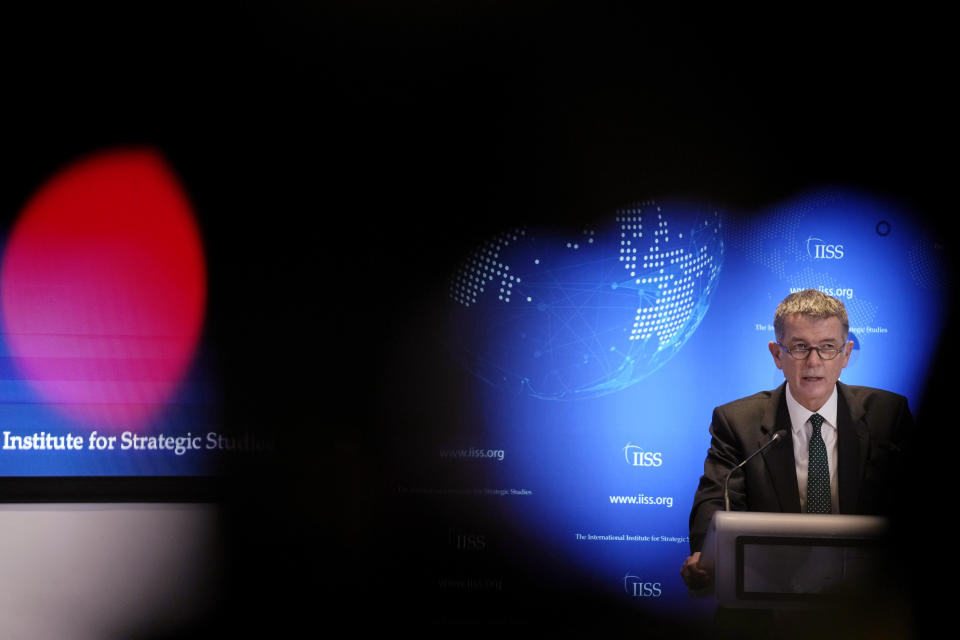 Richard Moore, the Chief of Britain's Secret Intelligence Service, also known as MI6, gives his first public speech since becoming head of the organisation, at the International Institute for Strategic Studies, in London, Tuesday, Nov. 30, 2021. China, Russia and Iran pose three of the biggest threats to the U.K. in a fast-changing, unstable world, the head of Britain's foreign intelligence agency said Tuesday. (AP Photo/Matt Dunham)