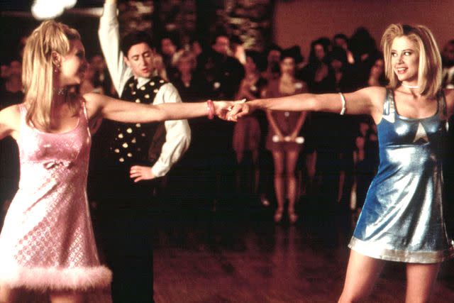 <p>Buena Vista/courtesy Everett Collection</p> Lisa Kudrow, Alan Cumming, and Mira Sorvino in 'Romy and Michele's High School Reunion.'