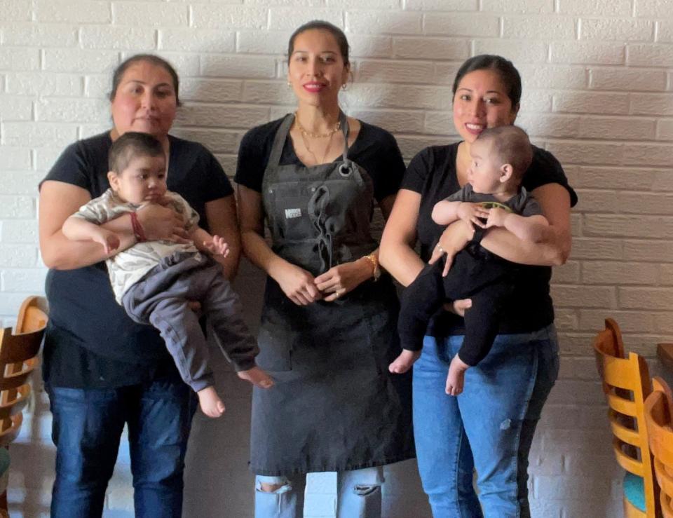 The women of Mariachi Mexico in Armonk. From left: Meto Herrera (with son Lukas), Joana Herrera, Sheena Garcia (and son Grayson).