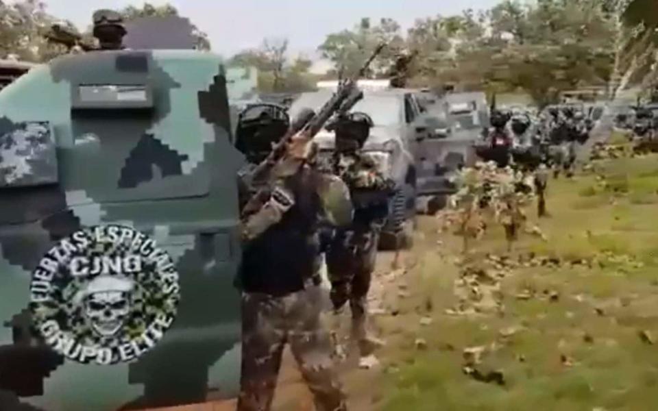 he military grade weapons, uniformed men and trucks standing in a line could be mistaken for Mexico’s beleaguered military