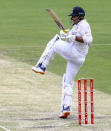 India's Mayank Agarwal bats during play on day three of the fourth cricket test between India and Australia at the Gabba, Brisbane, Australia, Sunday, Jan. 17, 2021. (AP Photo/Tertius Pickard)