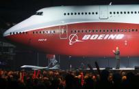 FILE PHOTO: Pat Shanahan speaks to employees and guests after a curtain was raised to unveil the 747-8 jumbo passenger jet at the company's Everett, Washington commercial airplane manufacturing facility