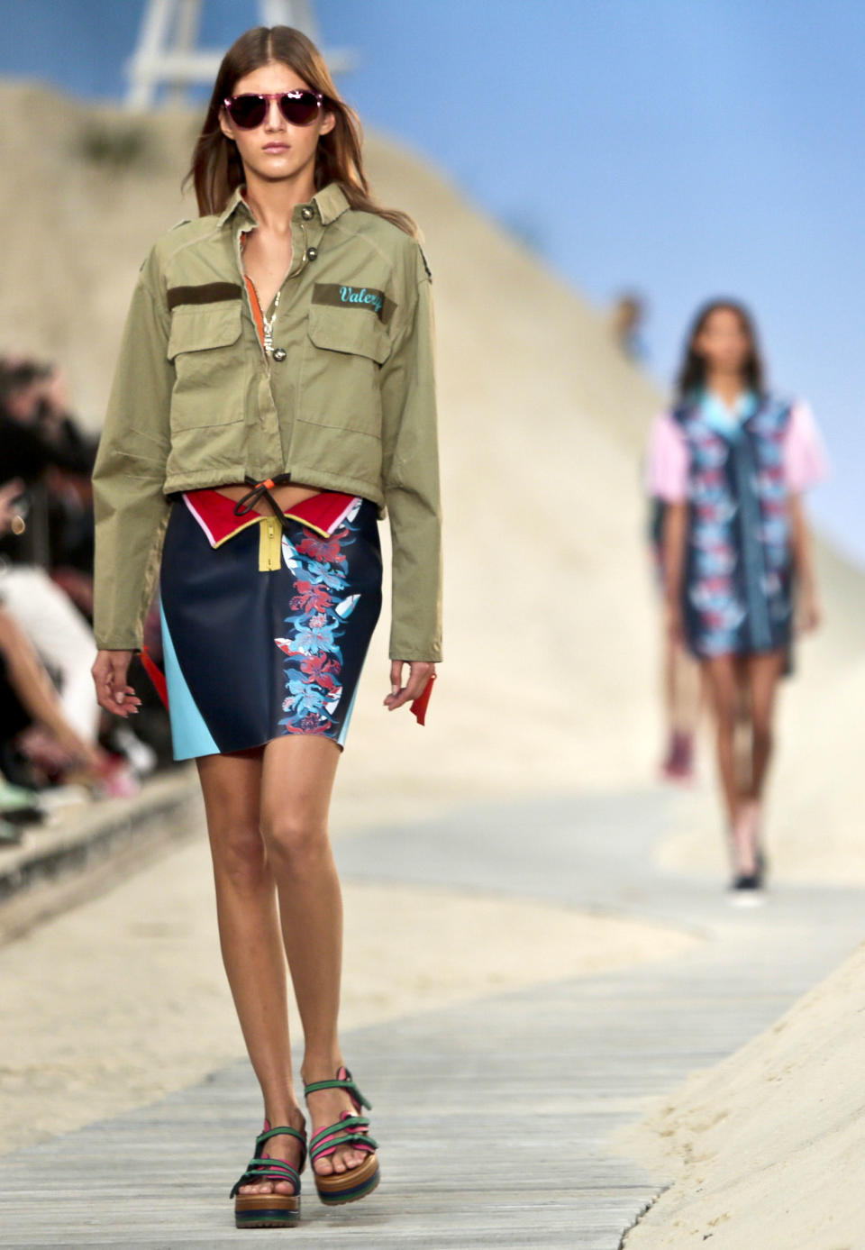 Fashion from the Tommy Hilfiger Spring 2014 collection is modeled on Monday, Sept. 9, 2013 in New York. (AP Photo/Bebeto Matthews)