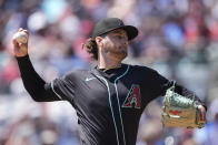 Arizona Diamondbacks starting pitcher Ryne Nelson (19) works in the first inning of a baseball game against the Atlanta Braves Sunday, April 7, 2024, in Atlanta. (AP Photo/John Bazemore)