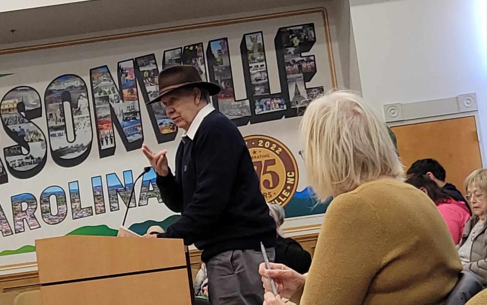 Resident Jim Thompson speaks during a neighborhood compatibility meeting on Jan. 29 at the City Operations Center about a proposed hotel to be built behind Blue Ridge Mall.
