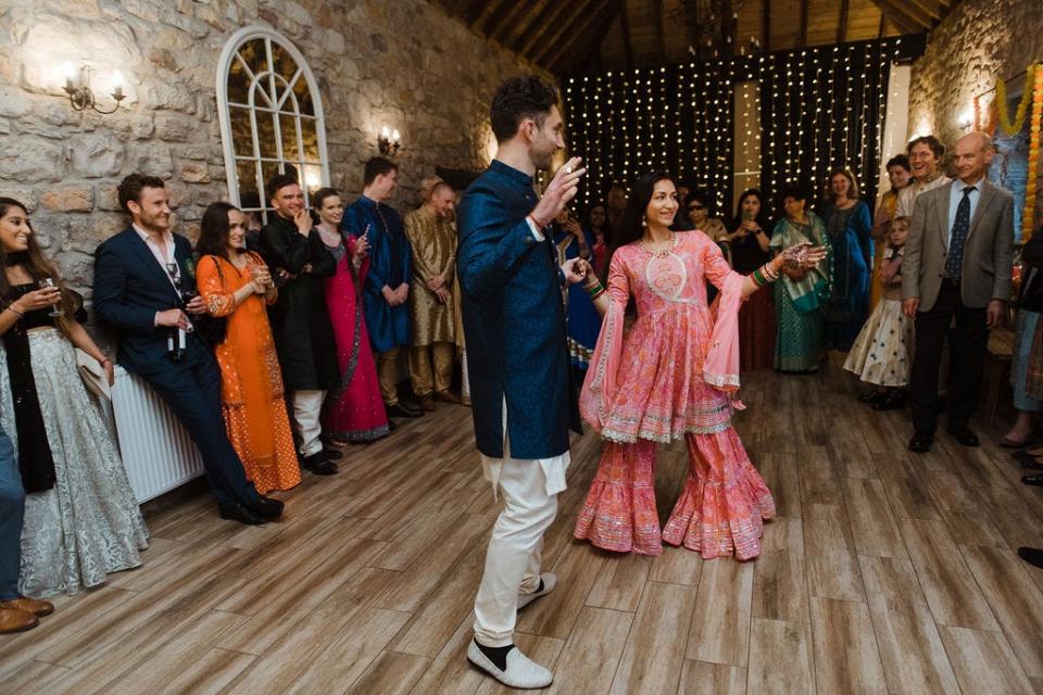 Alastair Spray and Angie Tiwari during the first dance at their wedding.