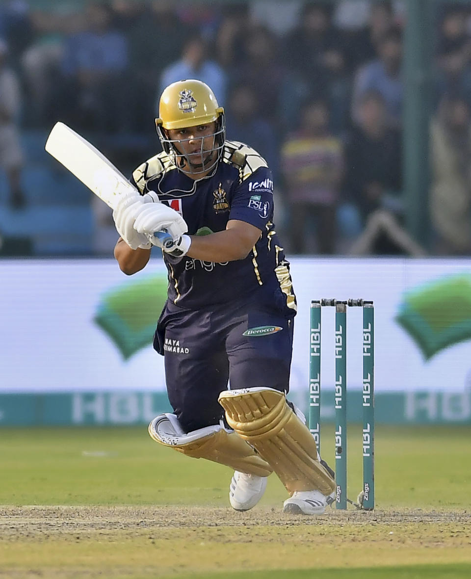 Quetta Gladiators batsman Azam Khan plays a shot during the Pakistan Super League T20 cricket match against Karachi Kings at National Stadium in Karachi, Pakistan, Sunday, Feb. 23, 2020. (AP Photo/Fareed Khan)