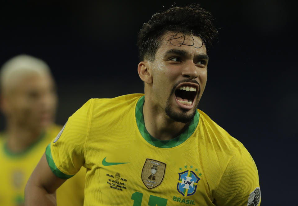 Brazil's Lucas Paqueta celebrates after scoring his side's opening goal against Peru during a Copa America semifinal soccer match at Nilton Santos stadium in Rio de Janeiro, Brazil, Monday, July 5, 2021. (AP Photo/Silvia Izquierdo)