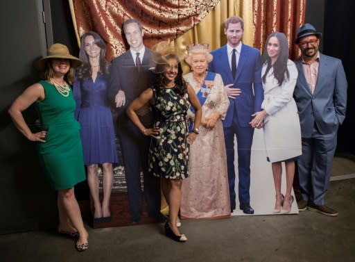 Patrons of a Washington bar celebrating this weekend's highly anticipated wedding pose with lifesize cutouts of the royal family