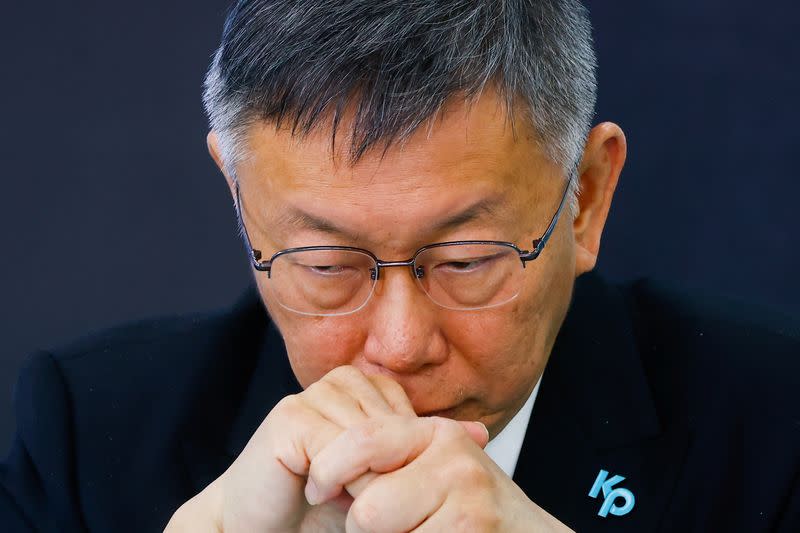 Taiwan People's Party Chairman Ko Wen-je reacts during a press event with the media in Taipei