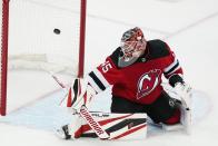 New Jersey Devils goaltender Jonathan Bernier reacts to a puck shot past him for a goal by Seattle Kraken's Jared McCann during the third period of an NHL hockey game Tuesday, Oct. 19, 2021, in Newark, N.J. The Devils won 4-2. (AP Photo/Frank Franklin II)