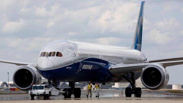 Boeing employees with a Boeing 787-10 Dreamliner.