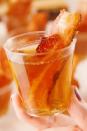 <p>Bacon and bourbon go better together than Thanksgiving and indulgence. All your favorite fall flavors in one killer shot.</p><p>Get the recipe from <a href="https://www.delish.com/cooking/recipe-ideas/a21348548/bacon-bourbon-jell-o-shots-recipe/" rel="nofollow noopener" target="_blank" data-ylk="slk:Delish;elm:context_link;itc:0;sec:content-canvas" class="link ">Delish</a>.</p>