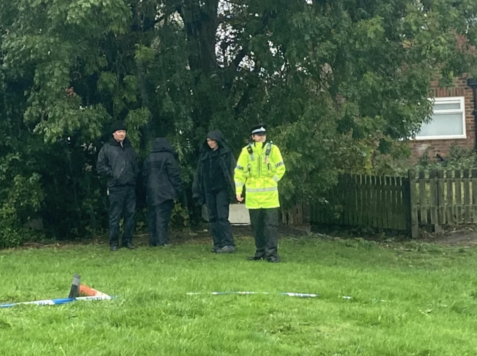 Police outside a property in Lightcliffe, near Halifax, where the body of a woman was discovered on Sunday. Source: Reach