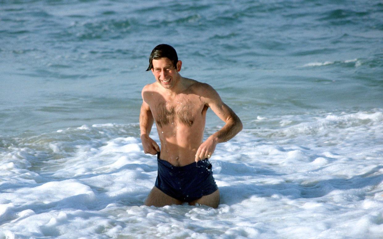 Charles, an ardent environmentalist, paddling in the sea at Bondi Beach during his visit to Australia in 1981 - Tim Graham Photo Library via Getty Images