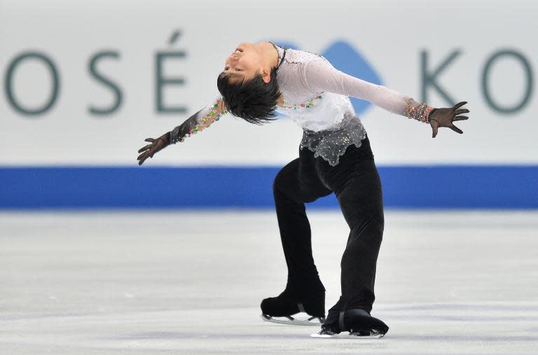 Japan's Yuzuru Hanyu performs during the men's free skating competition at the world figure skating championships in Saitama, on March 28, 2014