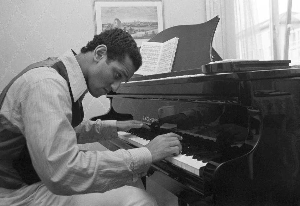 FILE - Andre Watts, 16, performs the Liszt piano concerto No. 1 with the New York Philharmonic, on Jan. 31, 1963. Watts died Wednesday, July 12, 2023 in Bloomington, Ind., at age 77. (AP Photo/Matty Zimmerman, File)